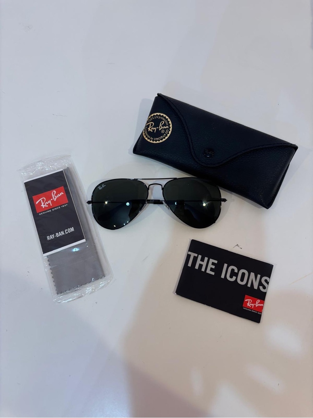 Ray-Ban Black Frame Sunglasses with Dark Green Lenses
